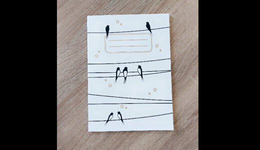 Carnet A5 Les hirondelles sur le fil ciel blanc